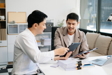  Team work process. Photo young business crew working with new startup project. Project managers meeting. Analyze plans, papers.