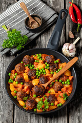 turkish meatball stew, sulu kofte, in a pan