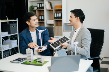 ESG concept of environmental, Green ethical business preserving resources, reducing CO2, Business person team working on laptop virtual smartphone