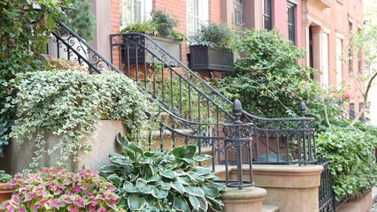 New York City townhouse building, Brooklyn Heights residential district, USA. Brownstone urban architecture, attached house. United States real estate, american property, apartments and homes in NYC.