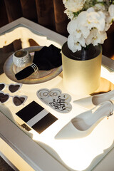 Wedding invitations. Wedding details of the bride. Bridal bouquet and other accessories. Shoes of the bride