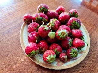 fresh ripe strawberries on a plate