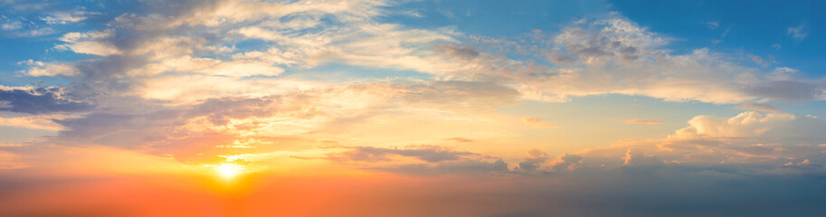 Ave real sky with sun - Pastel colors - Panoramic Sunrise Sundown Sanset Sky with colorful clouds. Without any birds.  Natural Cloudscape.