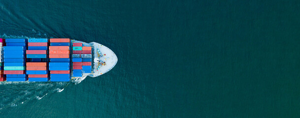 Aerial top view of Cargo container Ship, Cargo vessel ship carrying container and running for import export freight shipping sea freight by express for the international order concept.  © AU USAnakul