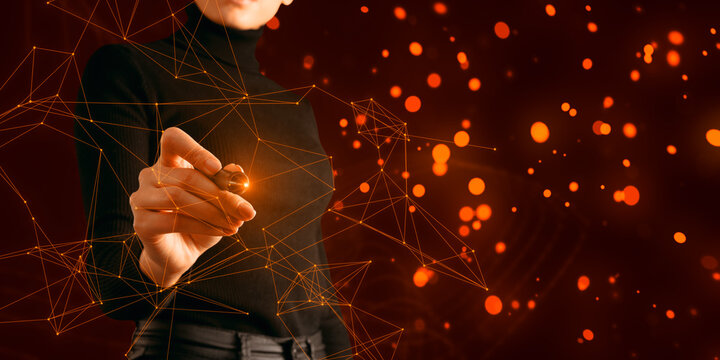 Close up of female hand with pen using glowing plexus pattern hologram on blurry background. Innovation and technology concept.