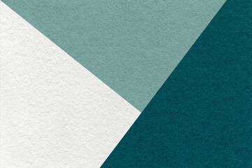 Texture of craft white, teal and emerald paper background, macro. Vintage abstract jade cardboard