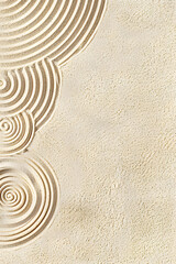 Top view pattern in Japanese Zen Garden with close up concentric circles on sand for meditation and relaxation. Aesthetic minimal sand background with copyspace,