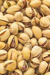 Ideas and Concepts of Food. Closeup View of Fried Fresh Pile of Pistachios Both Whole and Grinded.
