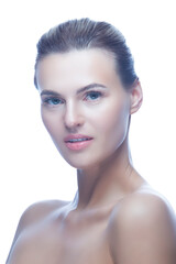 Obraz premium Beauty Skin. Blond Woman Model Showing Head and Shoulders Touching Glowing Hydrated Flourishing Facial Skin Apply Toner, Skin Cream Lotion For Healthy Look