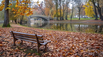 Serene autumn park fallen leaves a wooden bench and a picturesque bridge over a pond with copy space and open space