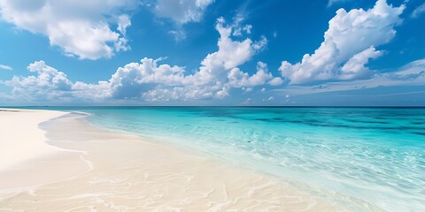 Beautiful sandy beach with white sand and rolling calm wave of turquoise ocean on Sunny day on background