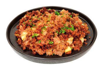 Traditional corned beef hash meal isolated on a white background