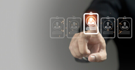 Human Resources concept. Businessman uses computers to search and select job applicants The process of selecting people to join the work of HR.