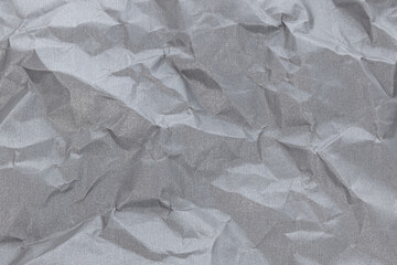 Paper with a metal texture. Crumpled, Silver background