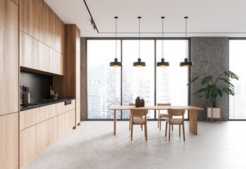 Home kitchen interior with eating table and cooking cabinet. Panoramic window