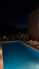 Close-Up of Swimming Pool at Night - Capturing the Serenity of Evening Relaxation