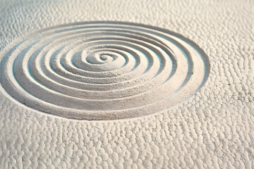 A circle in the sand. Zen Japanese garden. Background.