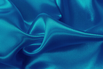 Dark blue fabric texture background, detail of silk or linen pattern.