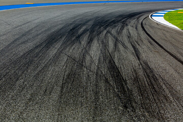 Asphalt race track with black tire mark texture and background, Abstract asphalt road race track background , Tire mark on race track texture and background.