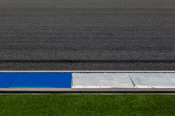 Fototapeta premium Asphalt race track with black tire mark texture and background, Abstract asphalt road race track background , Tire mark on race track texture and background.