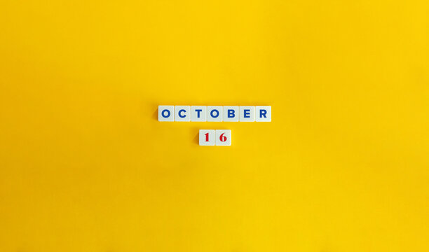 October 16. Text on Block Letter Tiles on Yellow Background. Minimal Aesthetics.