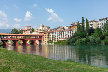 historic skyline of Bassano del Grappa with the Old wooden Bridge, also called ponte degli Alpini, Italy