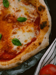 Delicious Neapolitan pizza Margherita close-up, top view