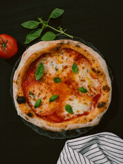 Delicious Neapolitan pizza Margherita close-up, top view