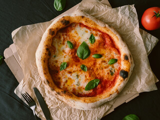 Delicious Neapolitan pizza Margherita close-up, top view