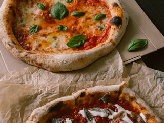 Freshly made Neapolitan pizzas close up