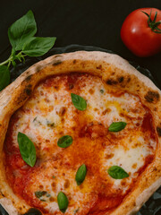 Delicious Neapolitan pizza Margherita close-up, top view