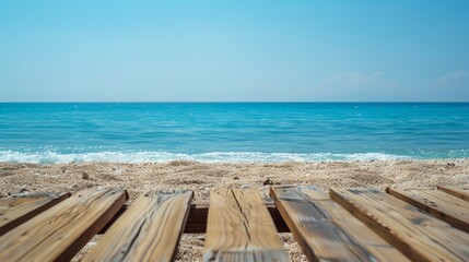 Close-up of a serene beach view with a wooden boardwalk leading to the blue ocean waters relaxation concept