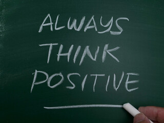Always think positive,  word text written on chalkboard, motivational inspirational quote