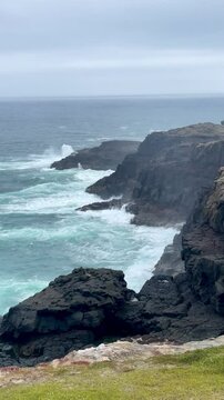 Capture the wild beauty of Cape Bridgewater, Australia, in this stunning vertical 4k video. Featuring stormy seas, crashing waves, and rocky cliffs, this coastal scenery showcases the raw power.