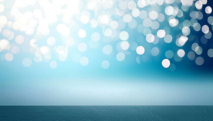 Soft blue abstract background with blurred bokeh lights, perfect for winter holiday designs