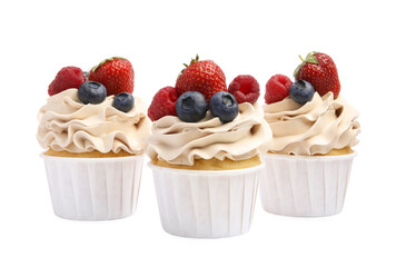 Tasty cupcakes with different berries isolated on white