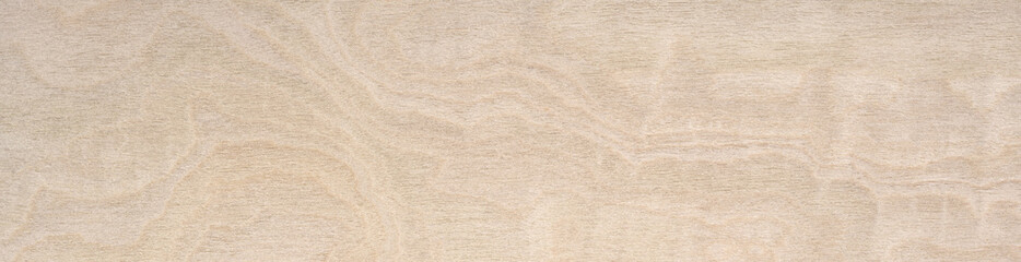 Subtle interplay of light beige and cream swirls in a delicate wood grain pattern, suggesting natural elegance and simplicity