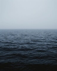 Obraz premium The soothing blue background provides a sense of tranquility and serenity in its pure simplicity.