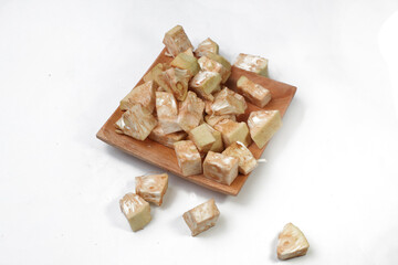 cut pieces of raw jack fruit, cooking preparations, isolated on white background