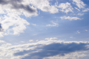 white and blue clouds against a blue sky on a sunny day