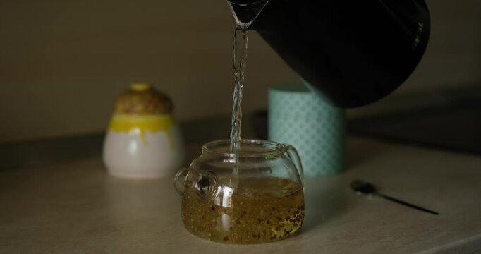 making green tea at the kitchen home table. Cosy home concept . High quality 4k footage