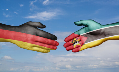 Mozambique and Germany country handshaking with flags, consensus concept international co-operation...