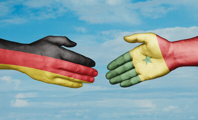 Republic of Senegal and Germany country handshaking with flags, consensus concept international...
