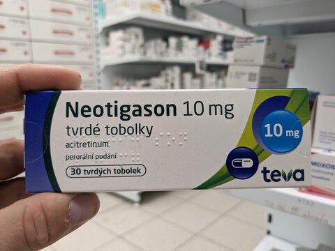 Prague, Czech Republic - July 10 2024: NEOTIGASON TEVA box of medication with ACITRETIN active substance by TEVA, used for treatment of severe psoriasis and skin disorders.

