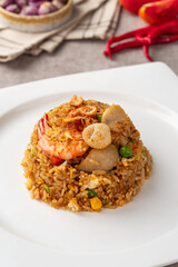 Asian fried rice (Indonesian: nasi goreng) with squid, prawns, and fish baso