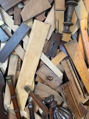 Pile of wooden fire pit furniture. Woodworking industry. Furniture parts and pieces. Seamless background