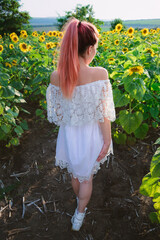  Girl with Pink Hair Walking through a Sunflower Field