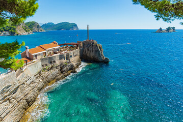  View of the rocky cape in the resort town of Petrovac, Castello Venetian fortress from the XVI...