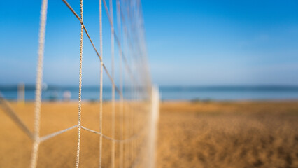 Volleyball net near. Volleyball court on the beach overlooking the sea
