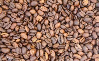 Coffee beans background. Close up of roasted coffee beans.
